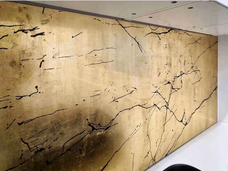 Detail of the craquelure over the gold leaf ground — CAworks architectural glass