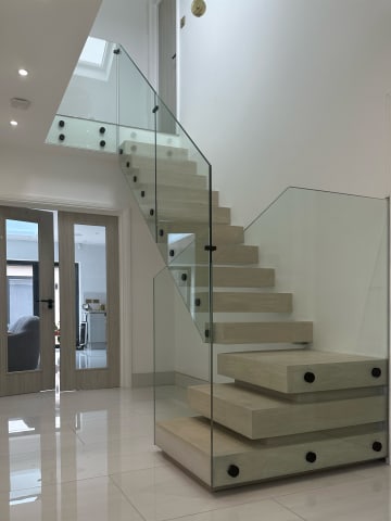 Floating · pale treads, frameless glass — staircase or glass install by CAworks