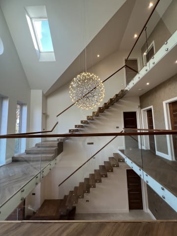 Glass balustrade · chandelier hall — staircase or glass install by CAworks