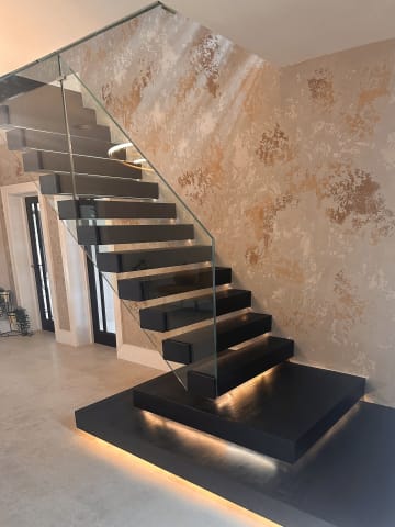 Floating · dark treads — staircase or glass install by CAworks