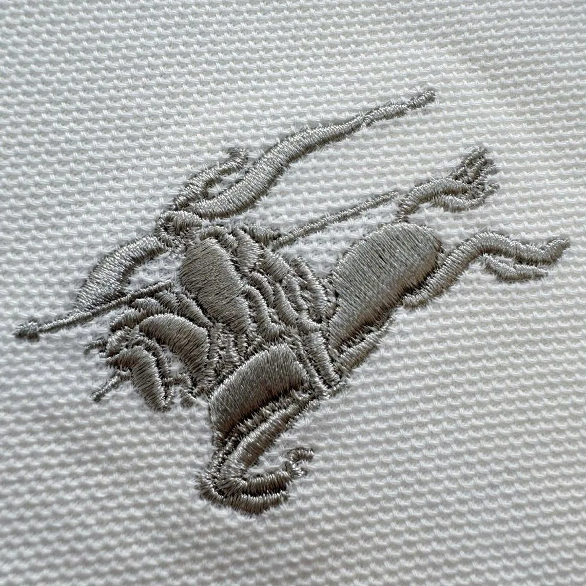 Áo polo nam màu trắng BBR mã 11 Burberry thượng hạng đẳng cấp thật Áo polo nam màu trắng BBR mã 11 Burberry thượng hạng đẳng cấp thật