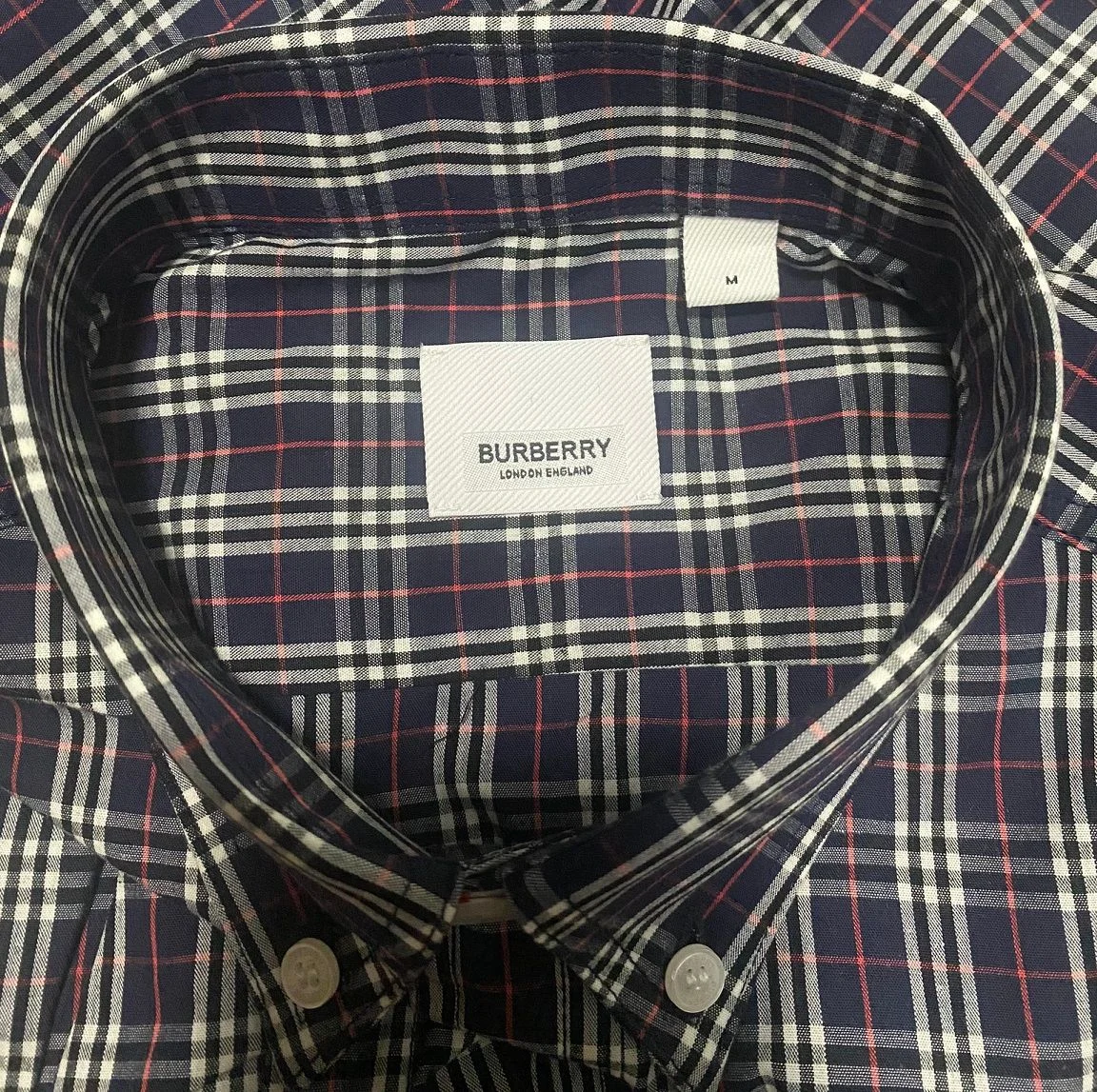 Áo sơ mi nam Burberry màu xanh kẻ sọc caro tay dài mã 20b BBR Áo sơ mi nam Burberry màu xanh kẻ sọc caro tay dài mã 20b BBR