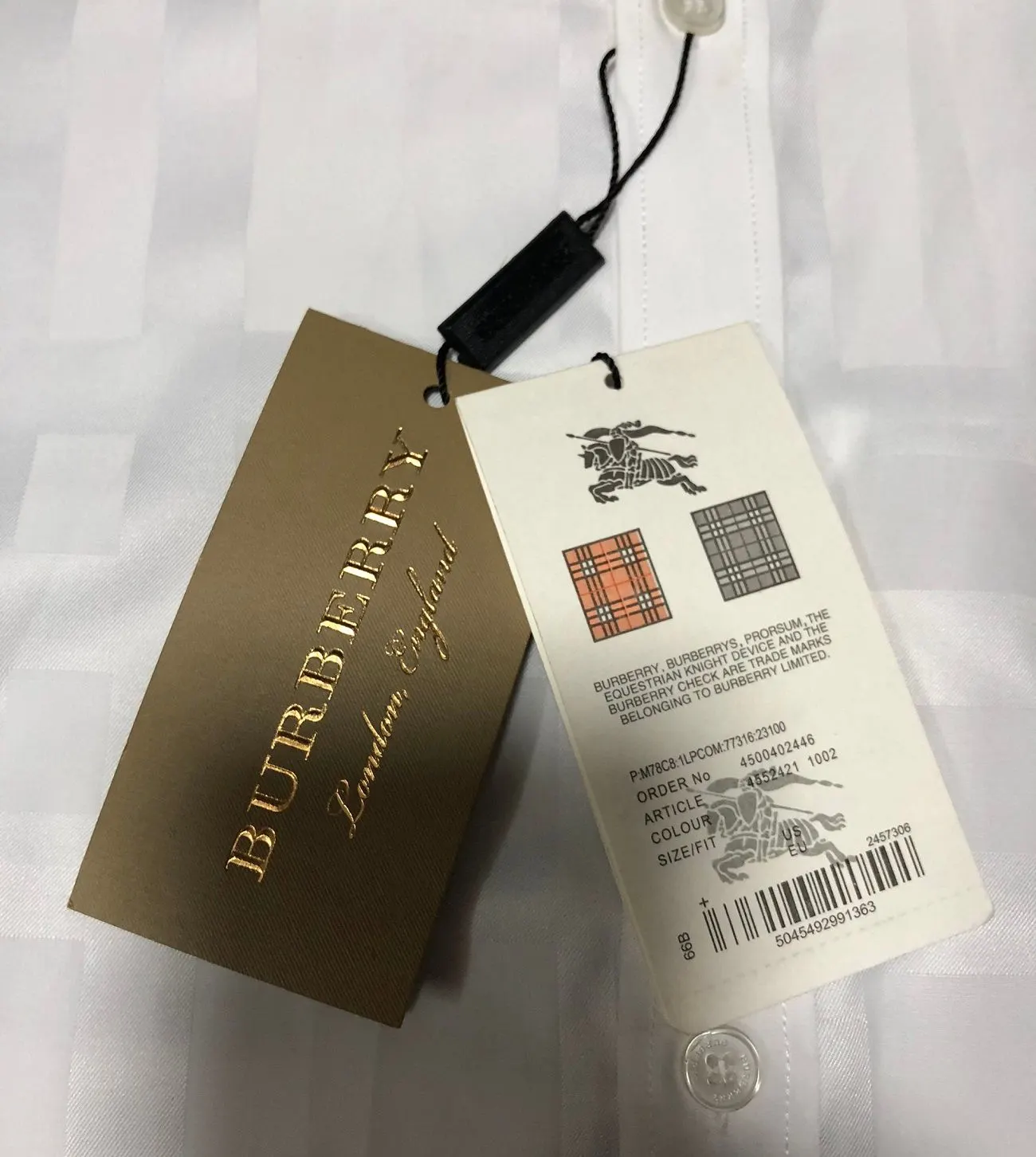 Áo sơ mi nam Burberry màu trắng tay ngắn kẻ sọc caro mã 22l đẹp Áo sơ mi nam Burberry màu trắng tay ngắn kẻ sọc caro mã 22l đẹp