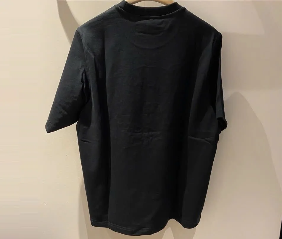 Áo thun đen trơn form rộng Kenzo mã 4 cổ tròn xịn phong cách nam nữ hợp mốt Áo thun đen trơn form rộng Kenzo mã 4 cổ tròn xịn phong cách nam nữ hợp mốt