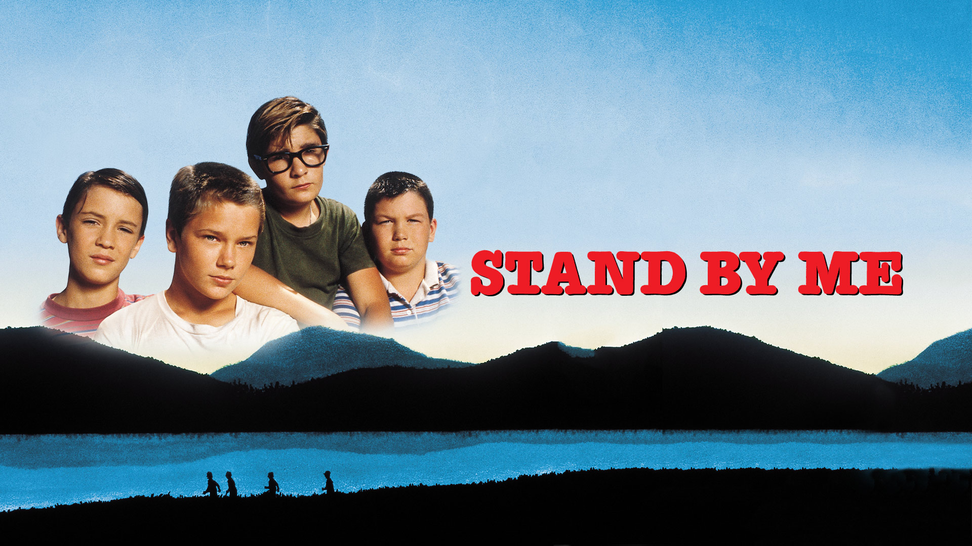 a picture of four boys put on an image with a background of mountains and a lake with 4 silhouettes running in the field
