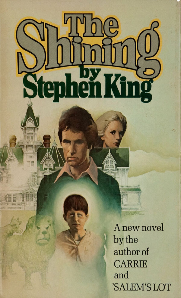 The Shining book cover, text with title and author Stephen King, in background is a house and three people
