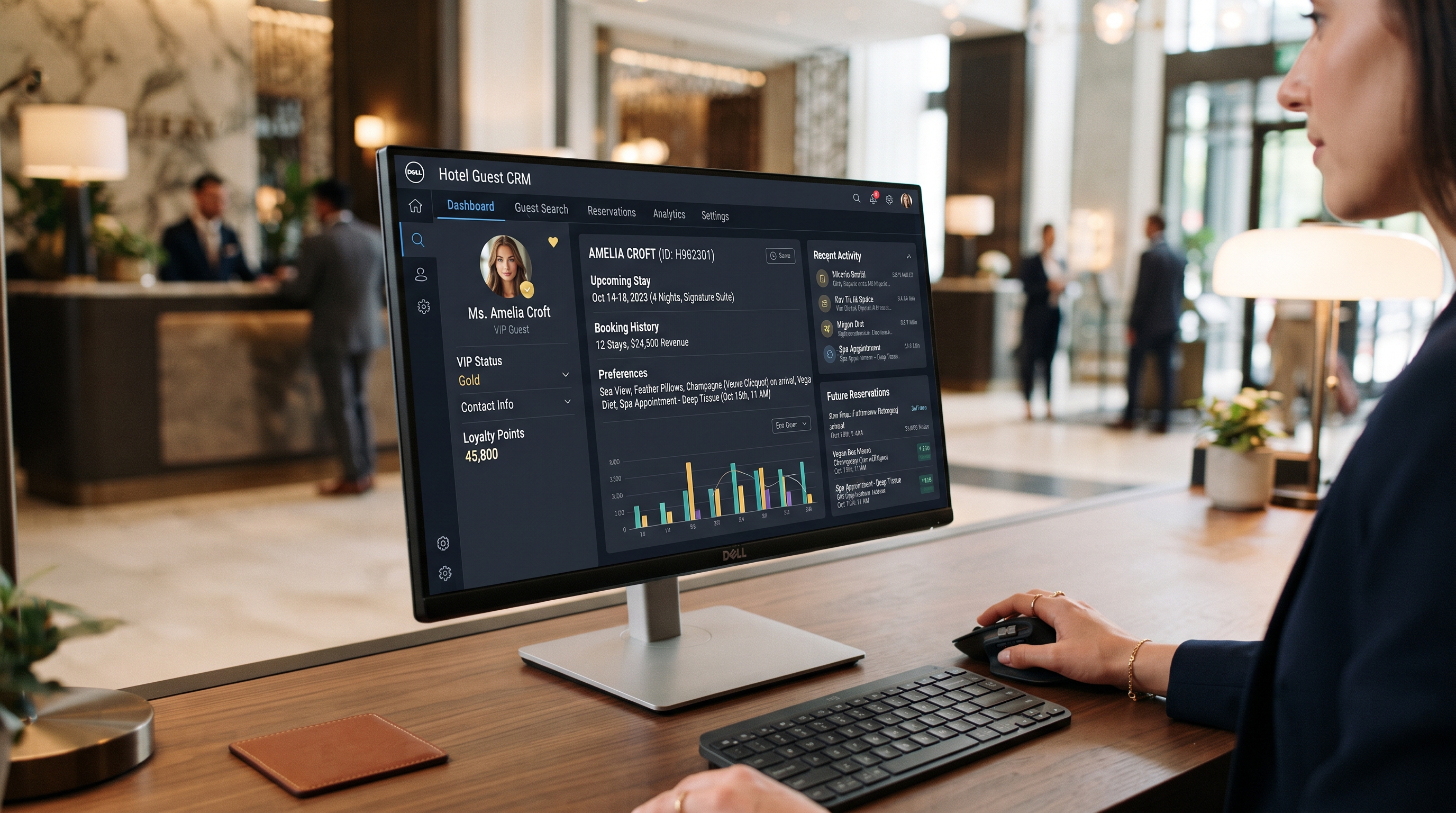 Hospitality staff using a CRM system to review guest preferences and booking history, illustrating CRM in hospitality management.