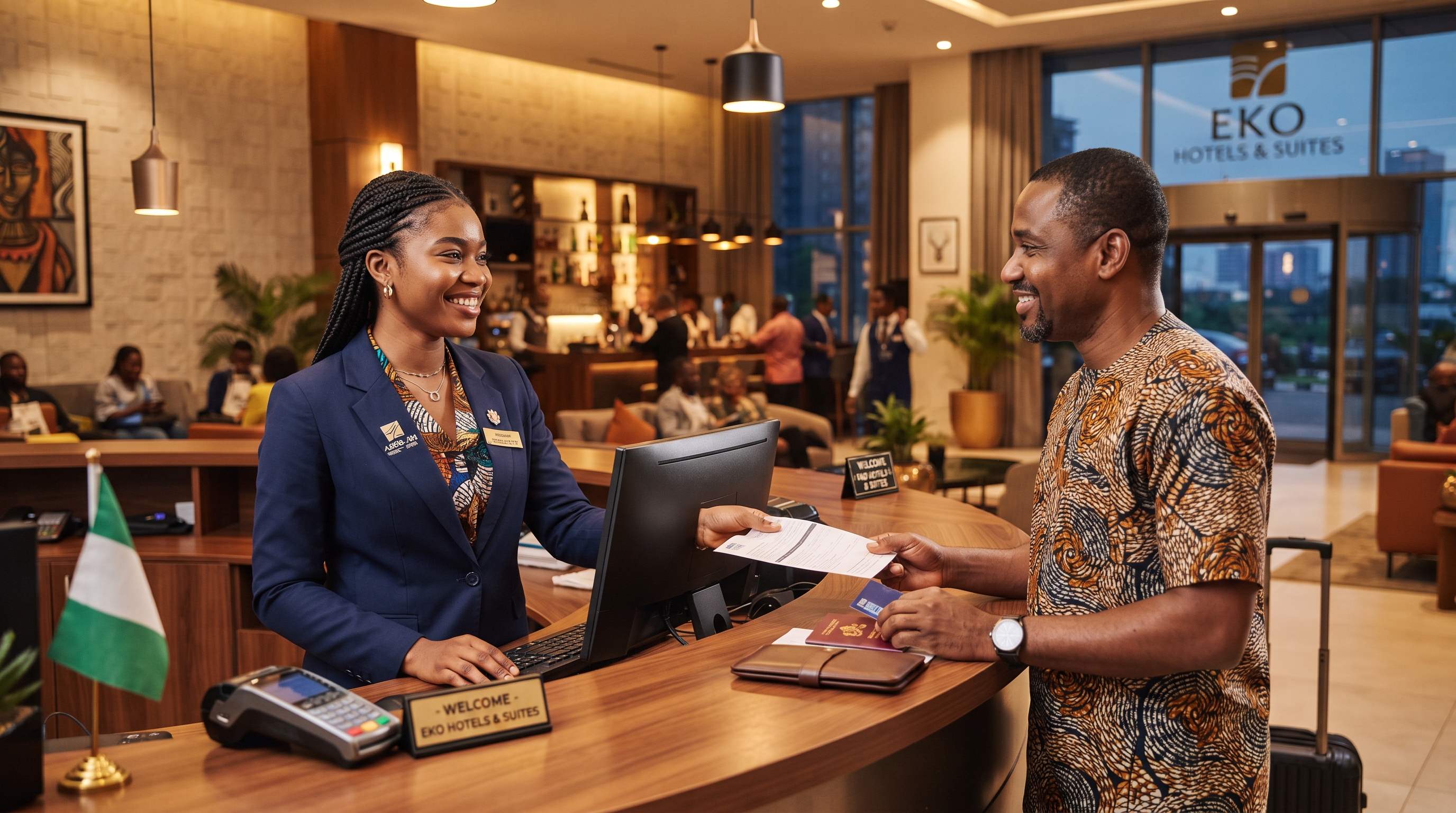Trained hotel front desk staff assisting a guest at check-in in a Lagos hotel, illustrating the hospitality staffing gap.