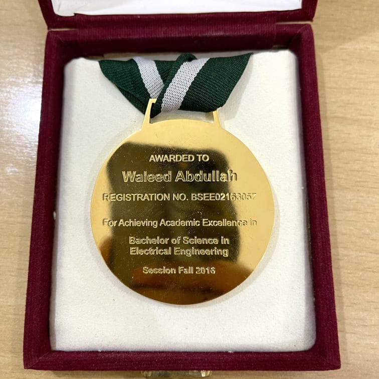 Waleed Abdullah with gold medal
