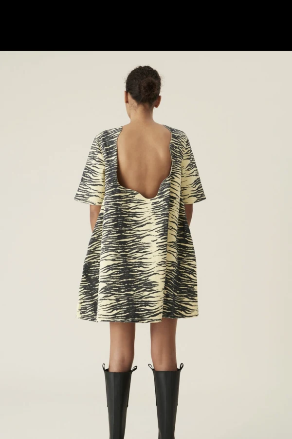 Rent Yellow tiger print ganni dress Ganni HURR