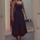 This Maje Flared Midi Dress in navy blue features a square neckline, silver-tone eyelet details, and a pleated skirt