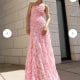 one-shoulder neckline with hand-pleated sunray detailing on French baroque-style lace.