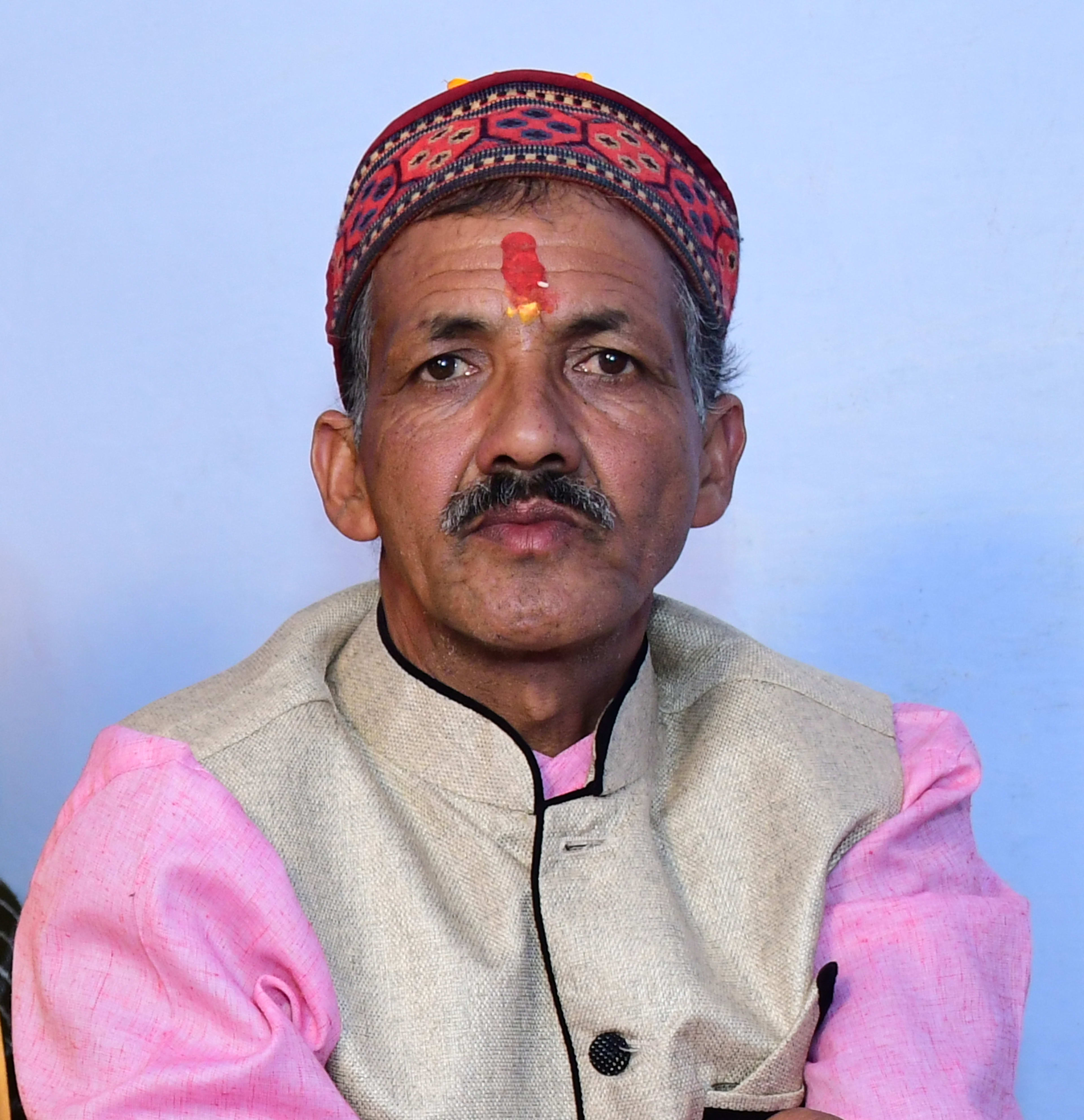 Mr. Kishan Bahuguna