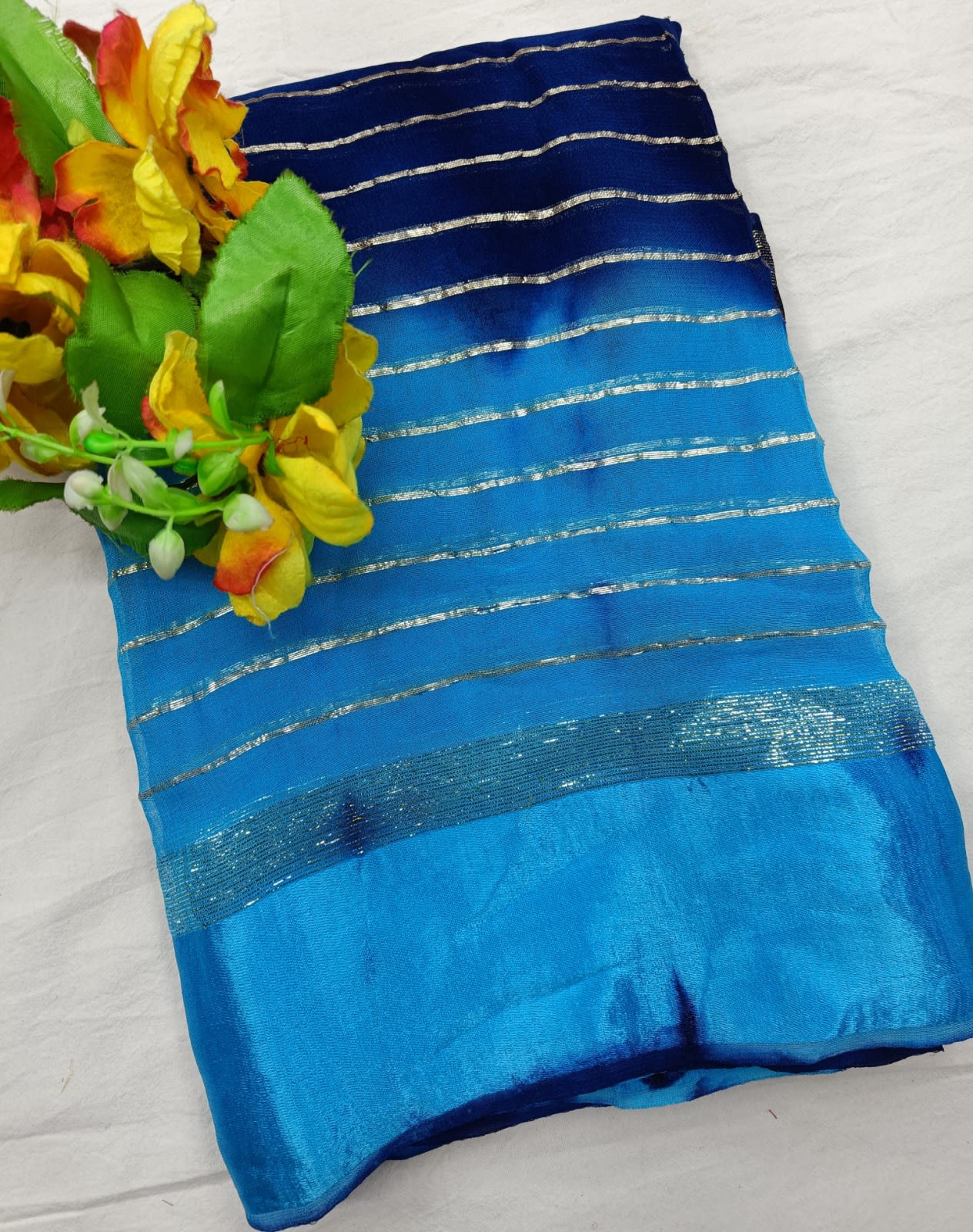 Trendy Pading Zari Stripe Georgette Saree