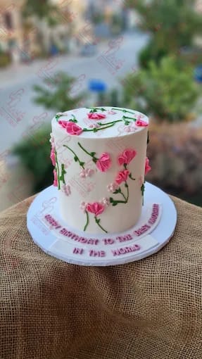 White Cake with Pink Buttercream Flowers Birthday Cake Rawalpindi