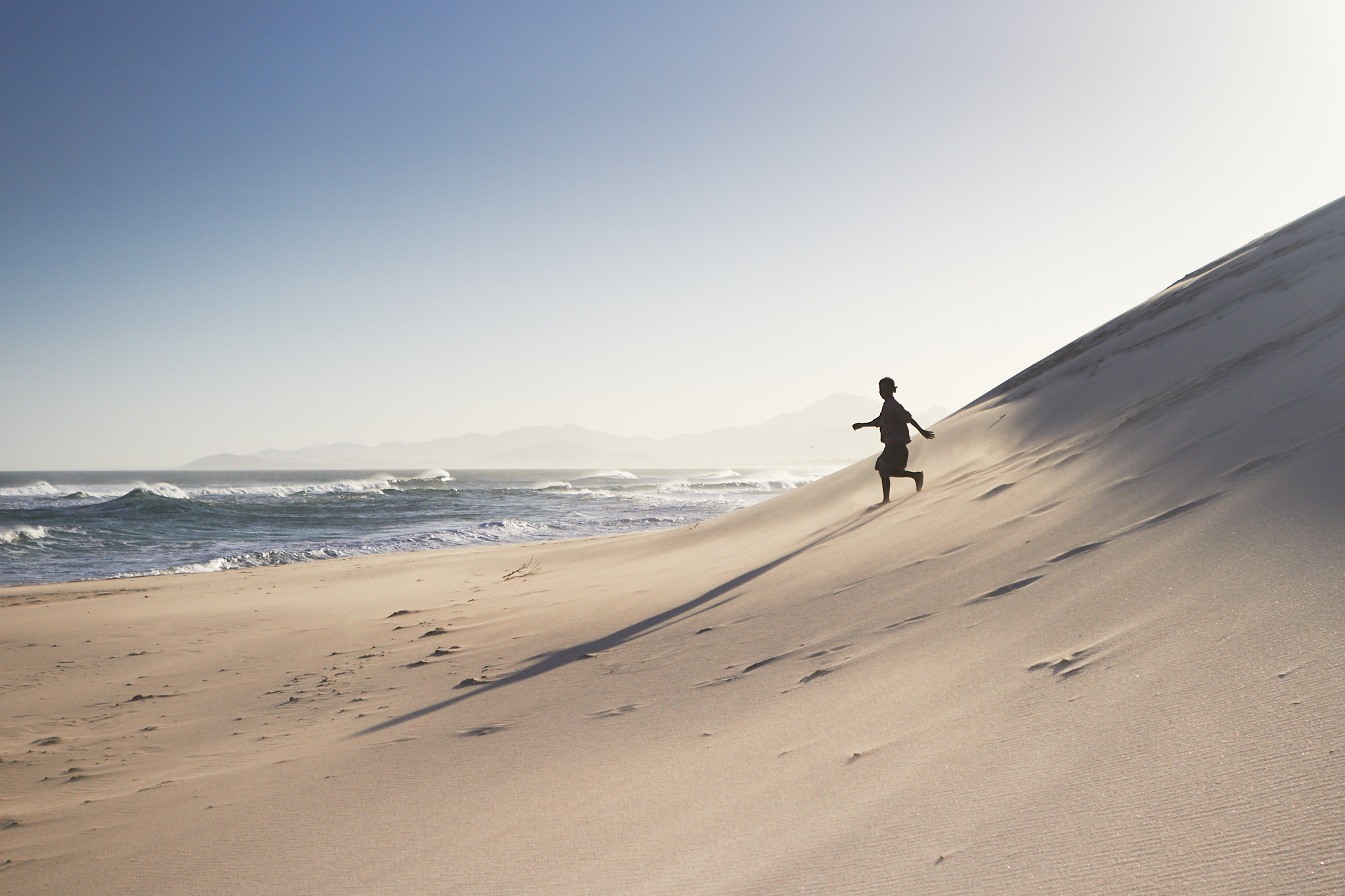 Striding down Dunes, Indian Ocean