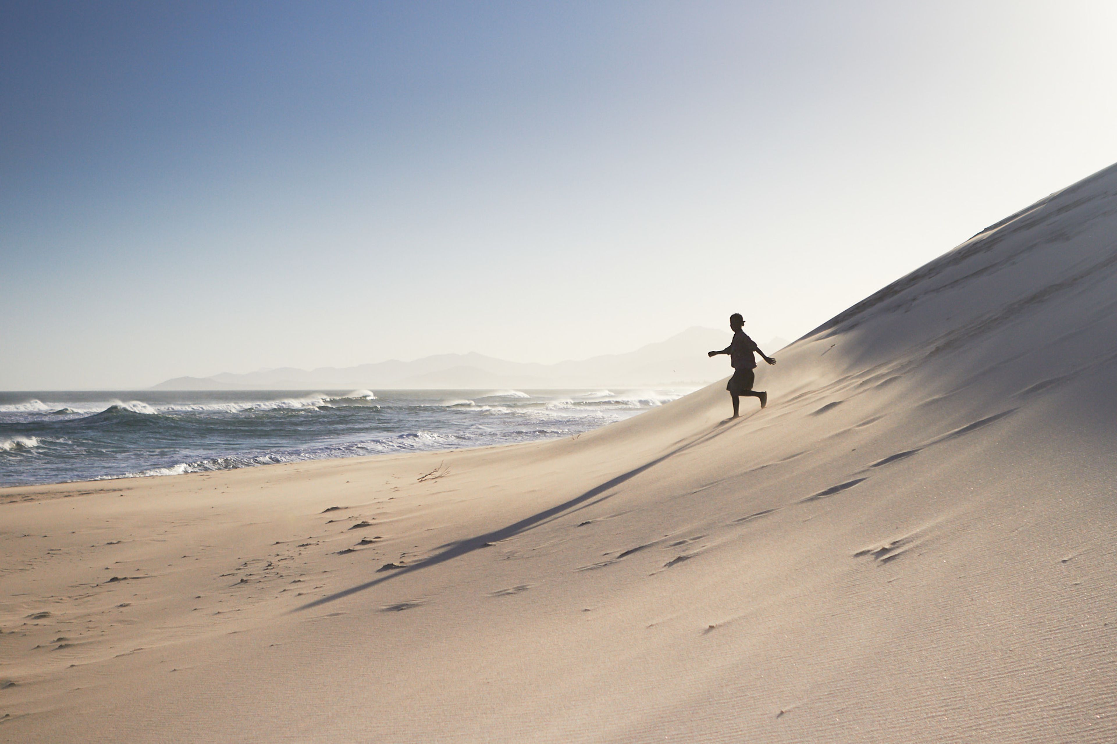 Striding down Dunes, Indian Ocean