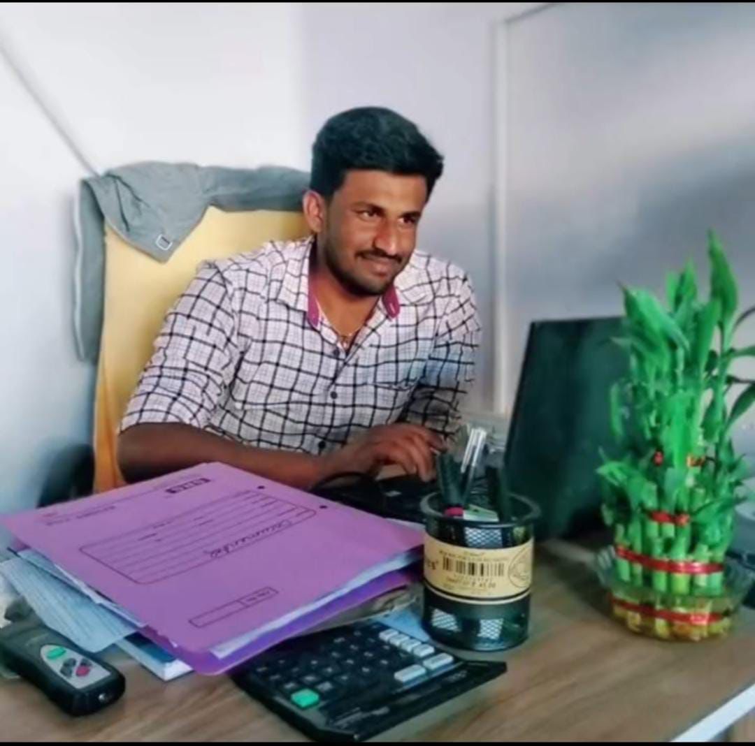 Farmer inspecting high-quality silkworm cocoons
