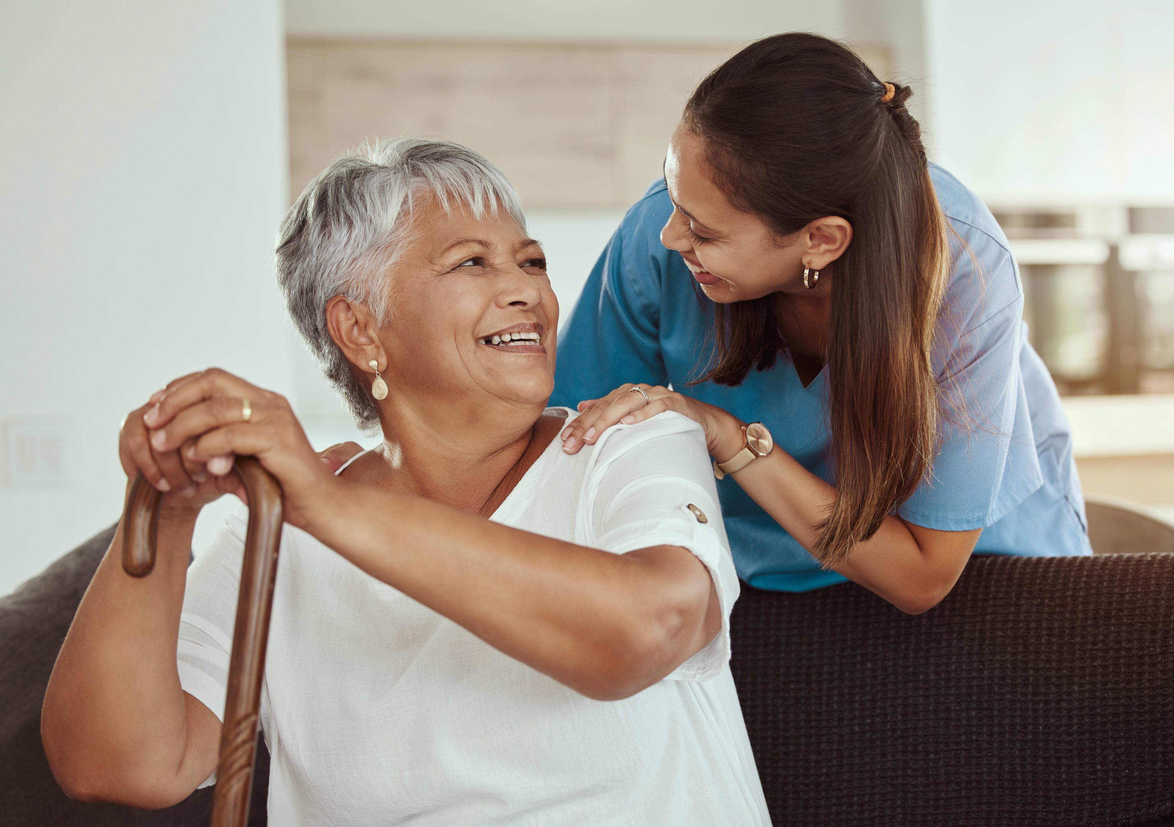 Clinician greets patient waiting for care.