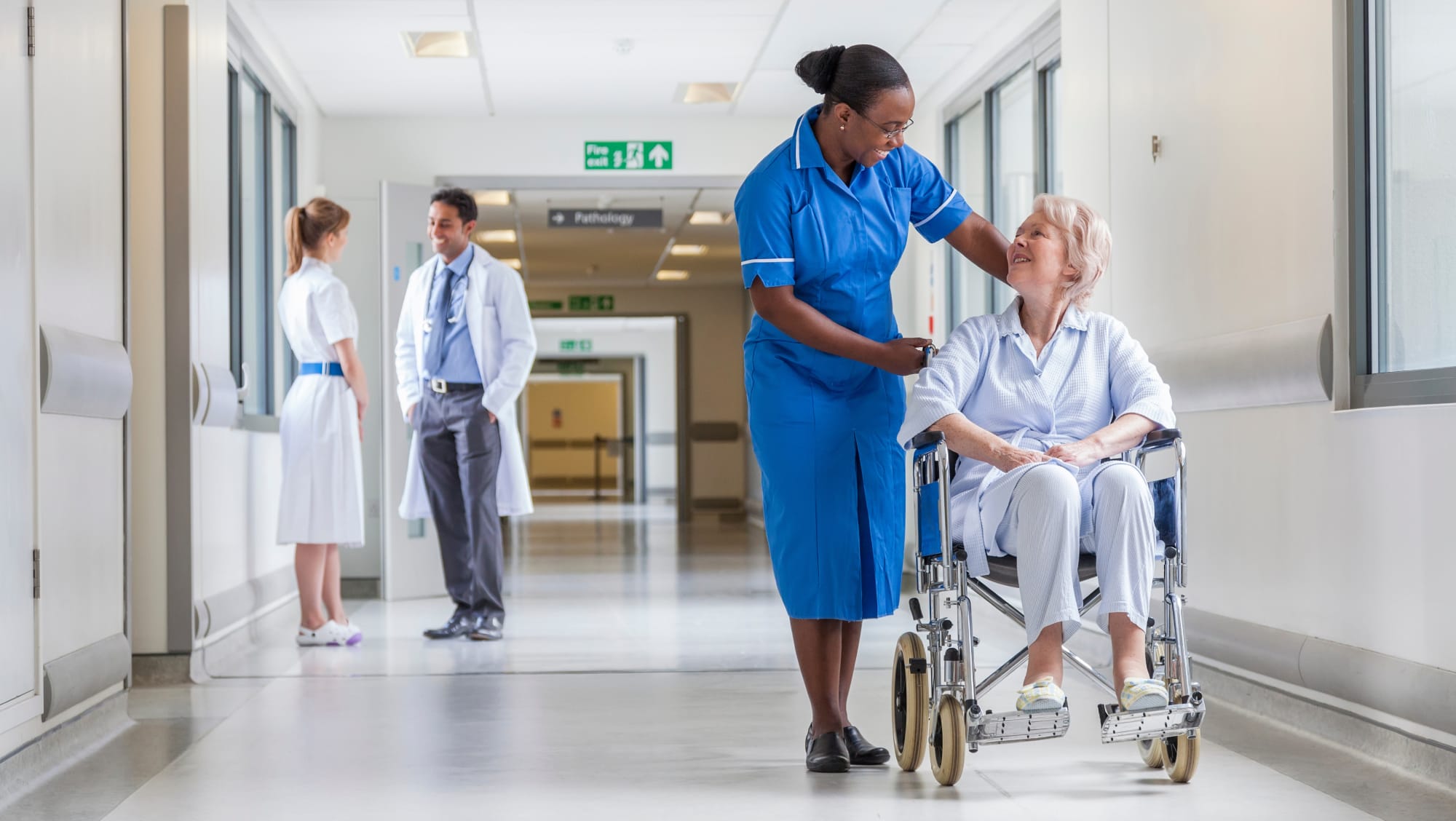 clinician-works-with-a-patient-in-a-wheelchair