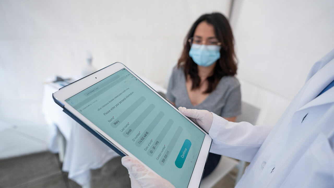 Clinician discusses care with patient