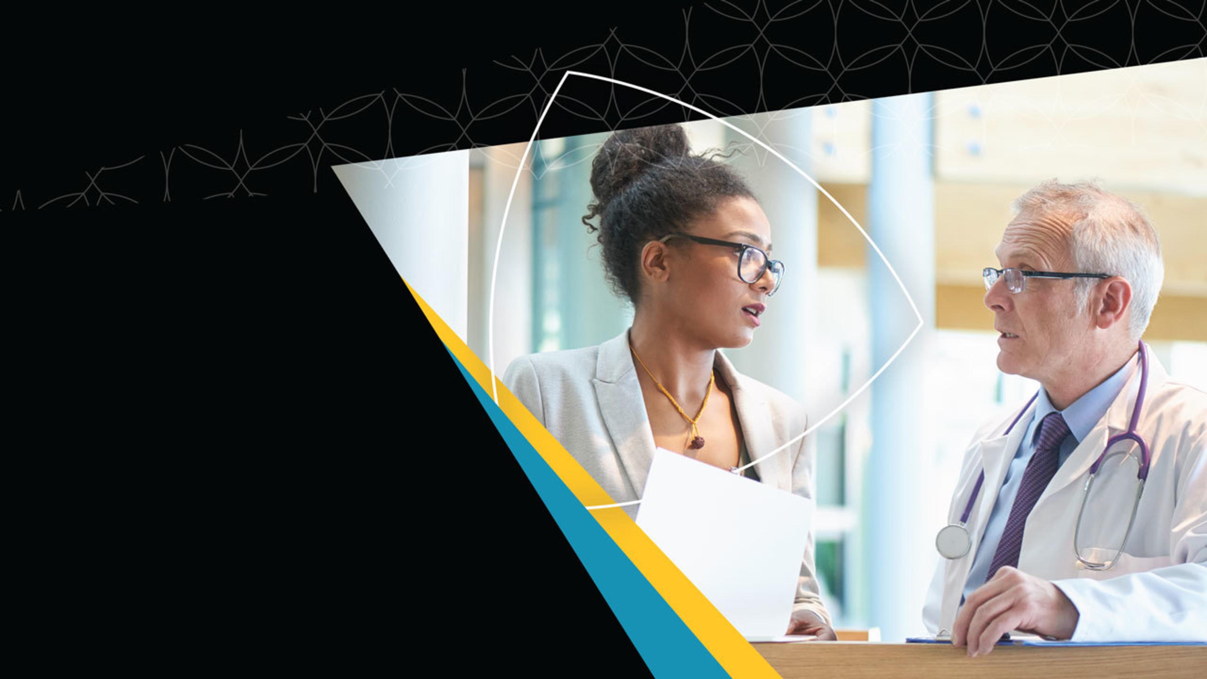 Two professionals talking, one in a suit with documents, the other in a white coat with stethoscope