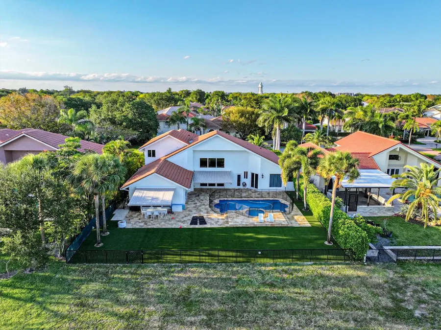 Luxury waterfront property aerial pool view
