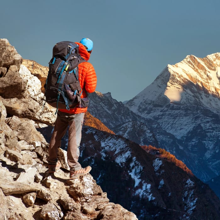 A hiker on the trail into Colca Canyon