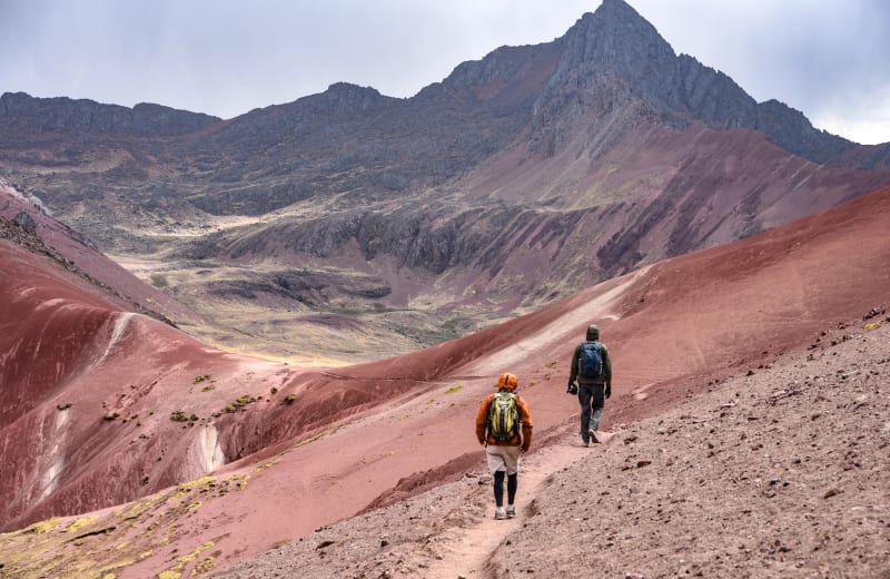 Hikers on the trail to Rainbow Mountain