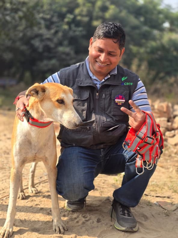 Surendra Sukhraj with a rescued dog during animal care work