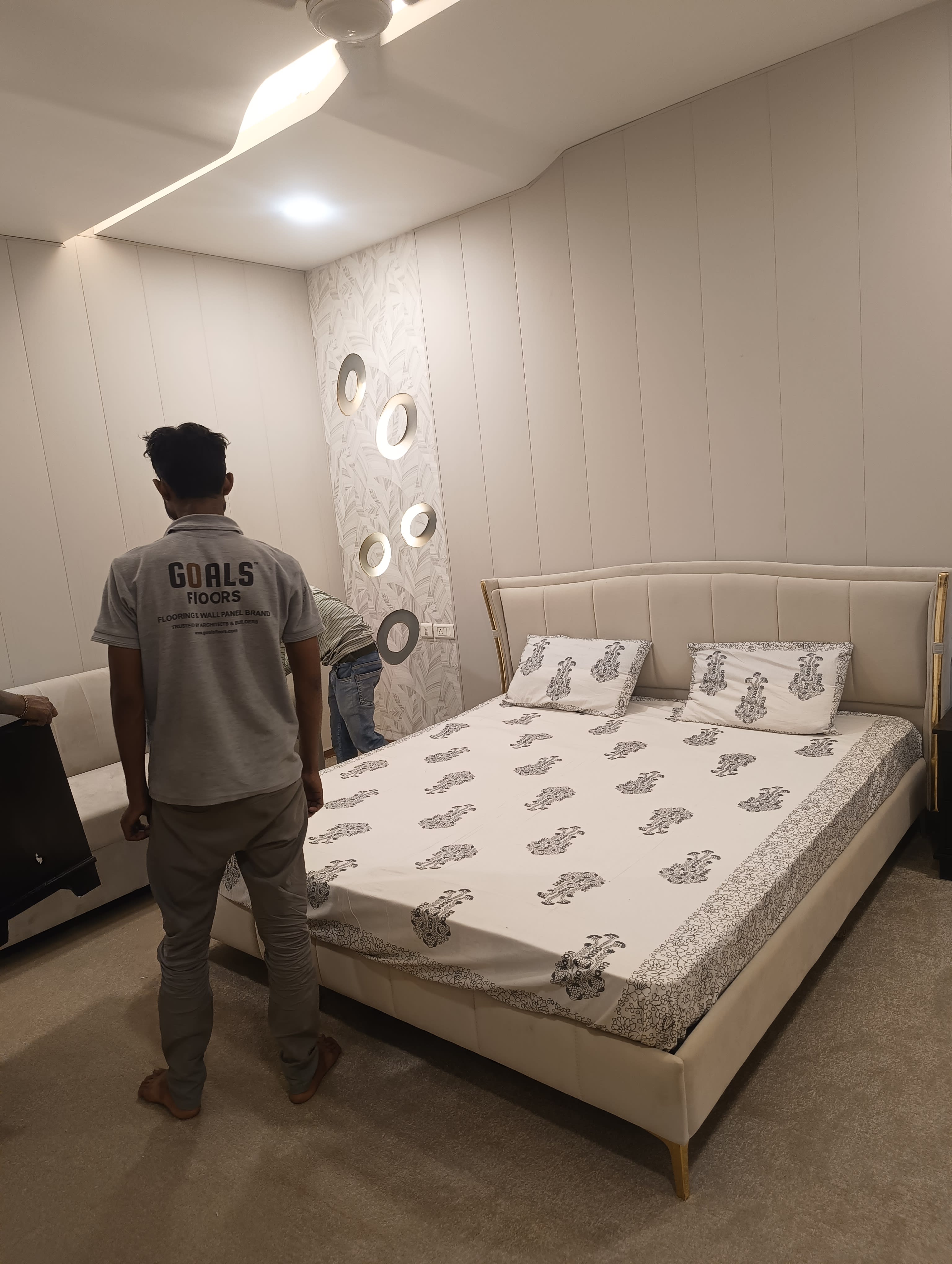 PVC Wall Panel installed in luxury bedroom behind headboard by Goals Floors