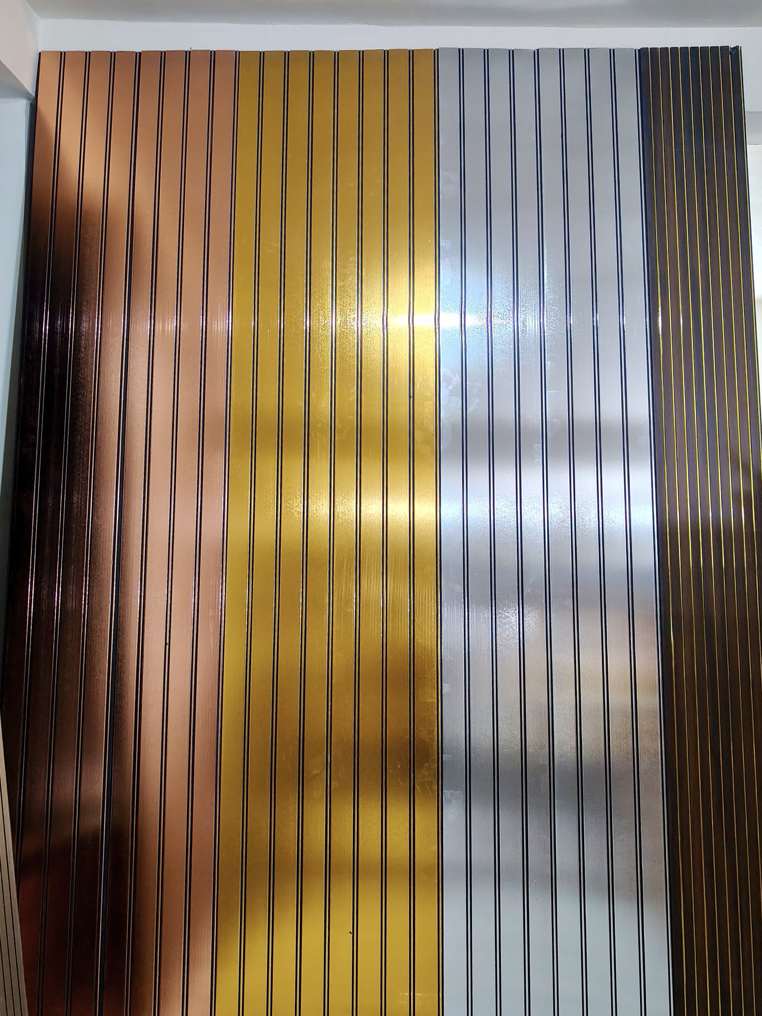Metallic Fluted Wall Panel architectural finish by Goals Floors
