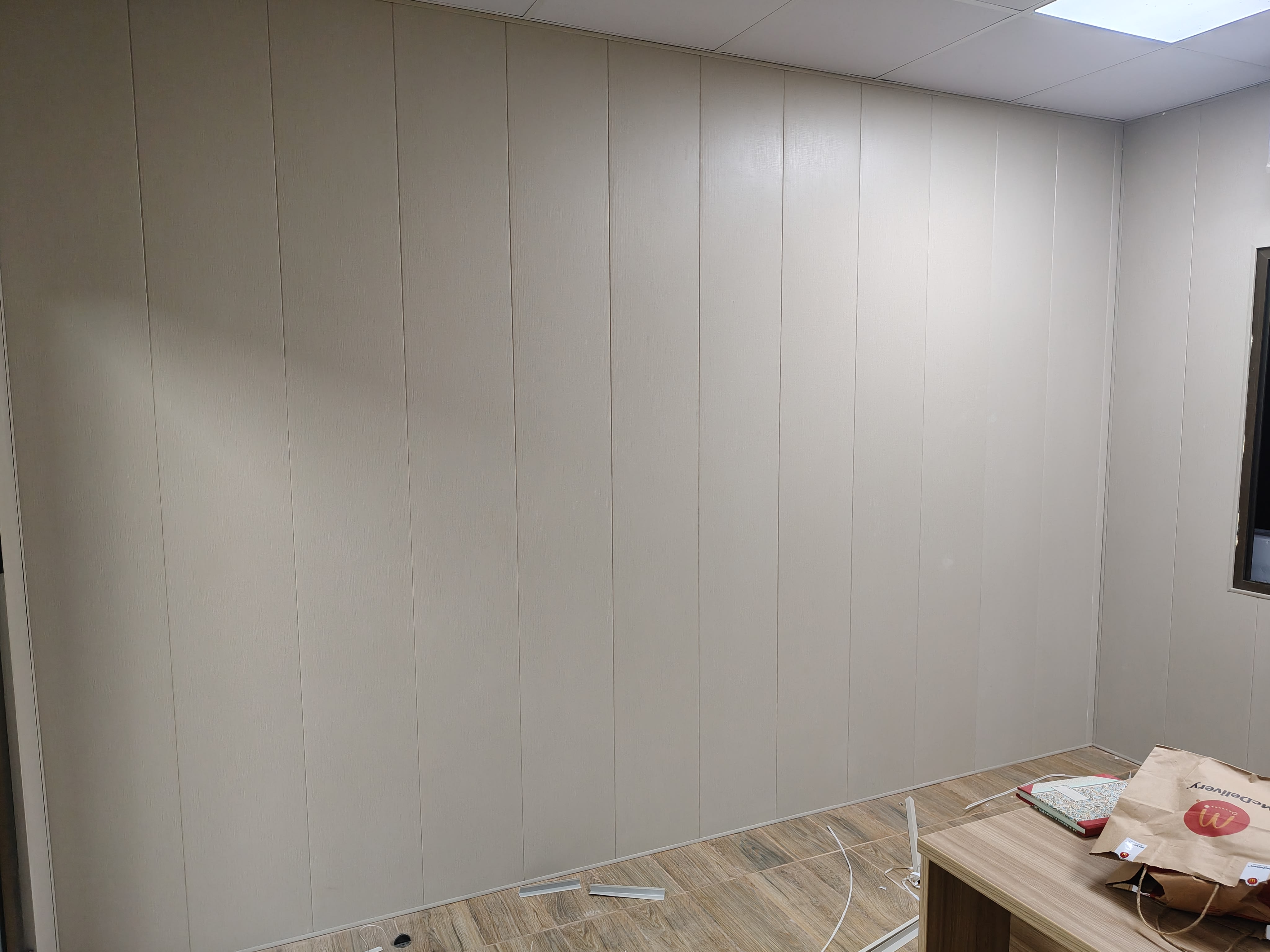 Fabric Texture Wall Panels installation in master bedroom by Goals Floors