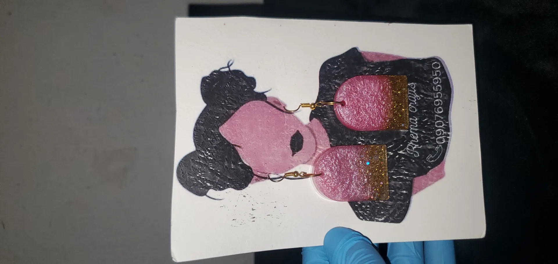Pink and gold Arc earnings  - Image 1
