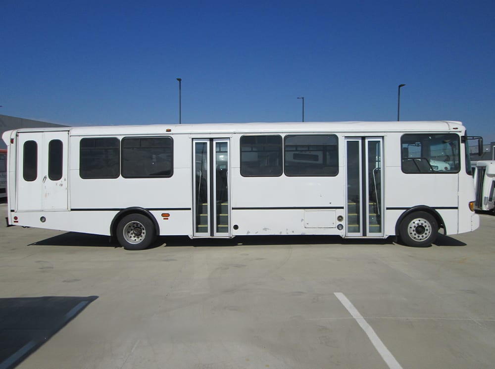 2013 Champion CTS Freightliner Bus  side view