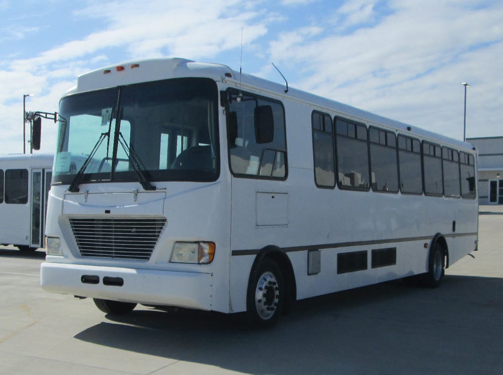 2013 Champion CTS Freightliner Bus front driver corner