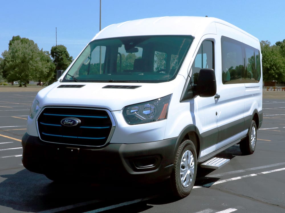 2022 Ford E-Transit 9 passenger drive side