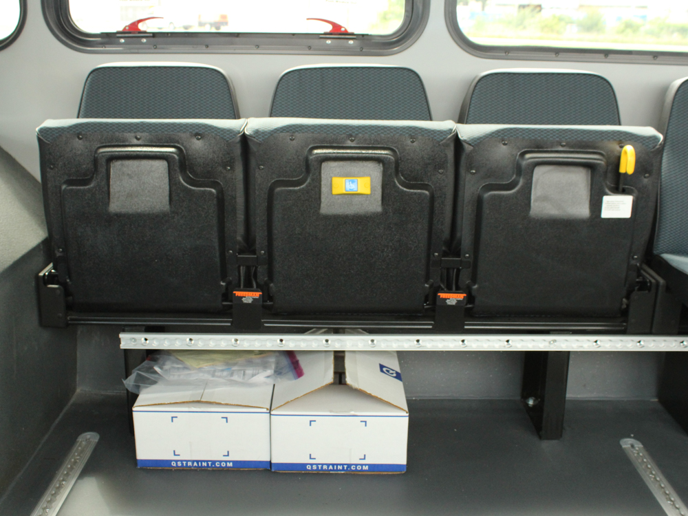 ARBOC Spirit of Equess view of interior of bus, close up of seats folded up