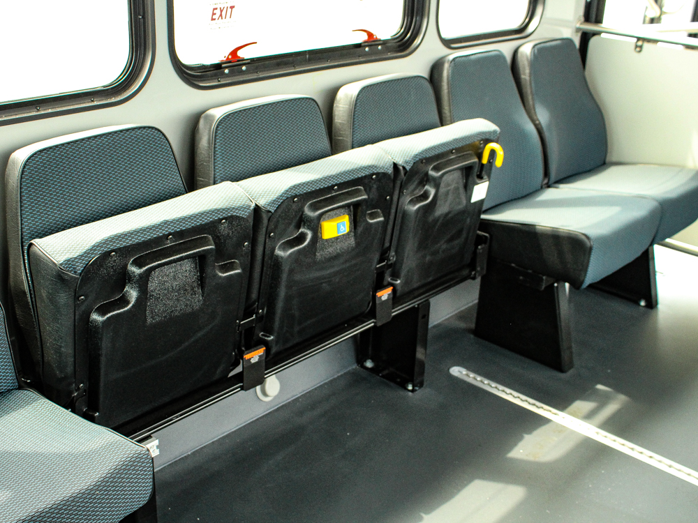 ARBOC Spirit of Equess view of interior of bus, close up of seats folded up from another angle