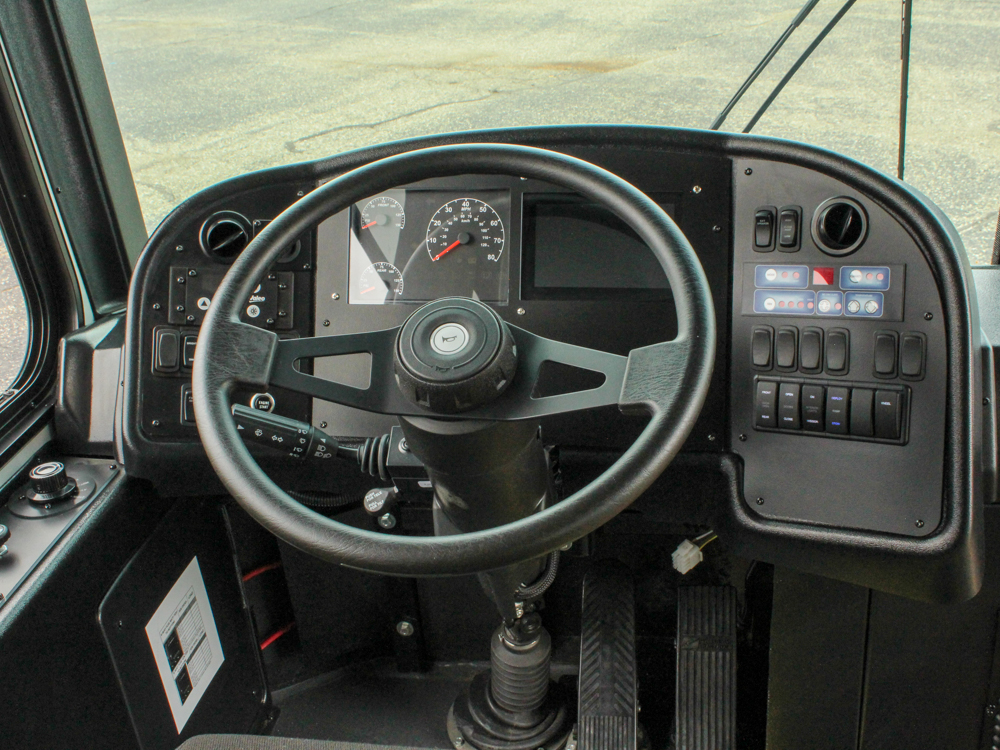 ARBOC Spirit of Equess view of interior of bus, driver's area and close up of steering wheel