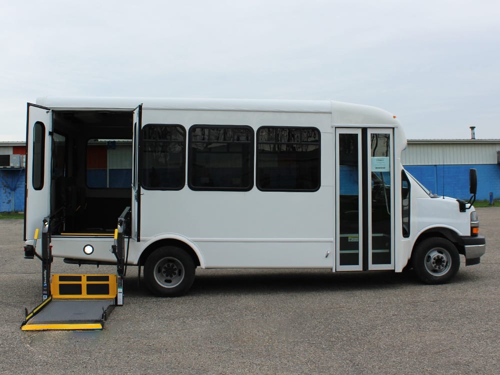 2023 Starcraft Allstar 22 14& Chevy side view of bus, passenger side with ramp deployed