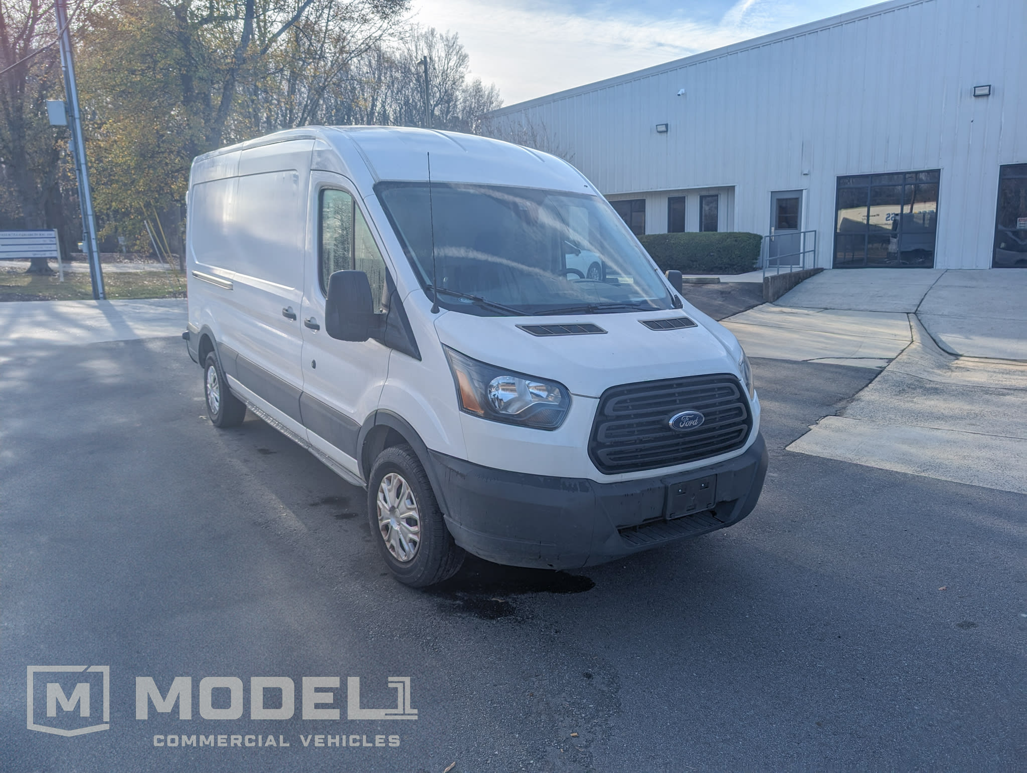 2019 Ford Transit 250 Med Roof Sliding Pass. 148 WB's photo