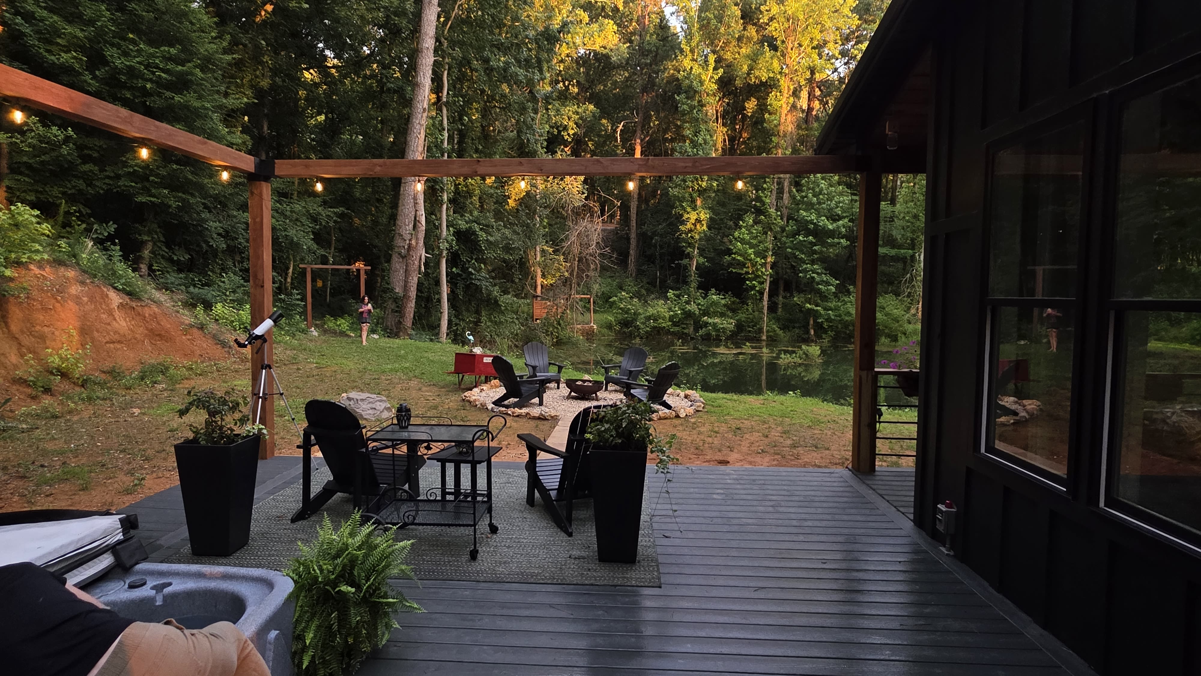 The finished hot tub deck looking out toward the fire pit and pond