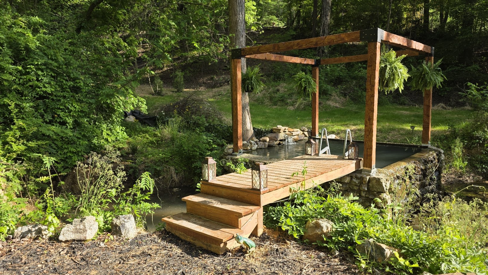 The spring-fed plunge pool and pergola