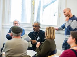 Person talking in a group of people