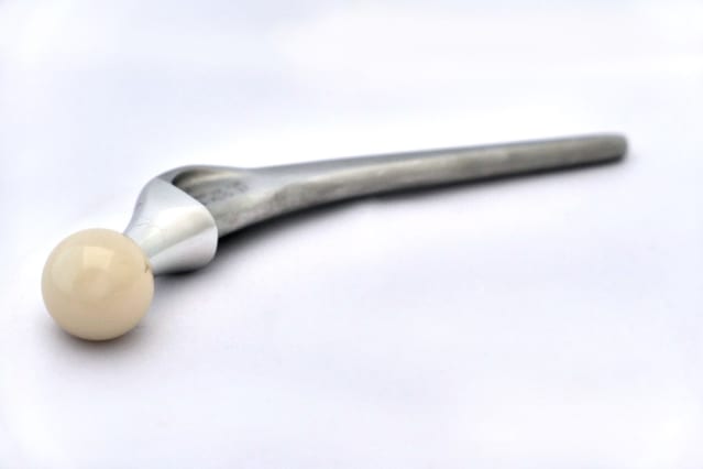 A picture of an artificial hip in metal