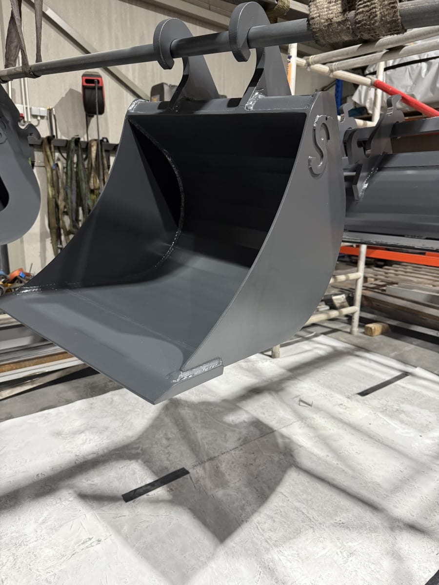 Detailfoto van laswerk met Structon S logo