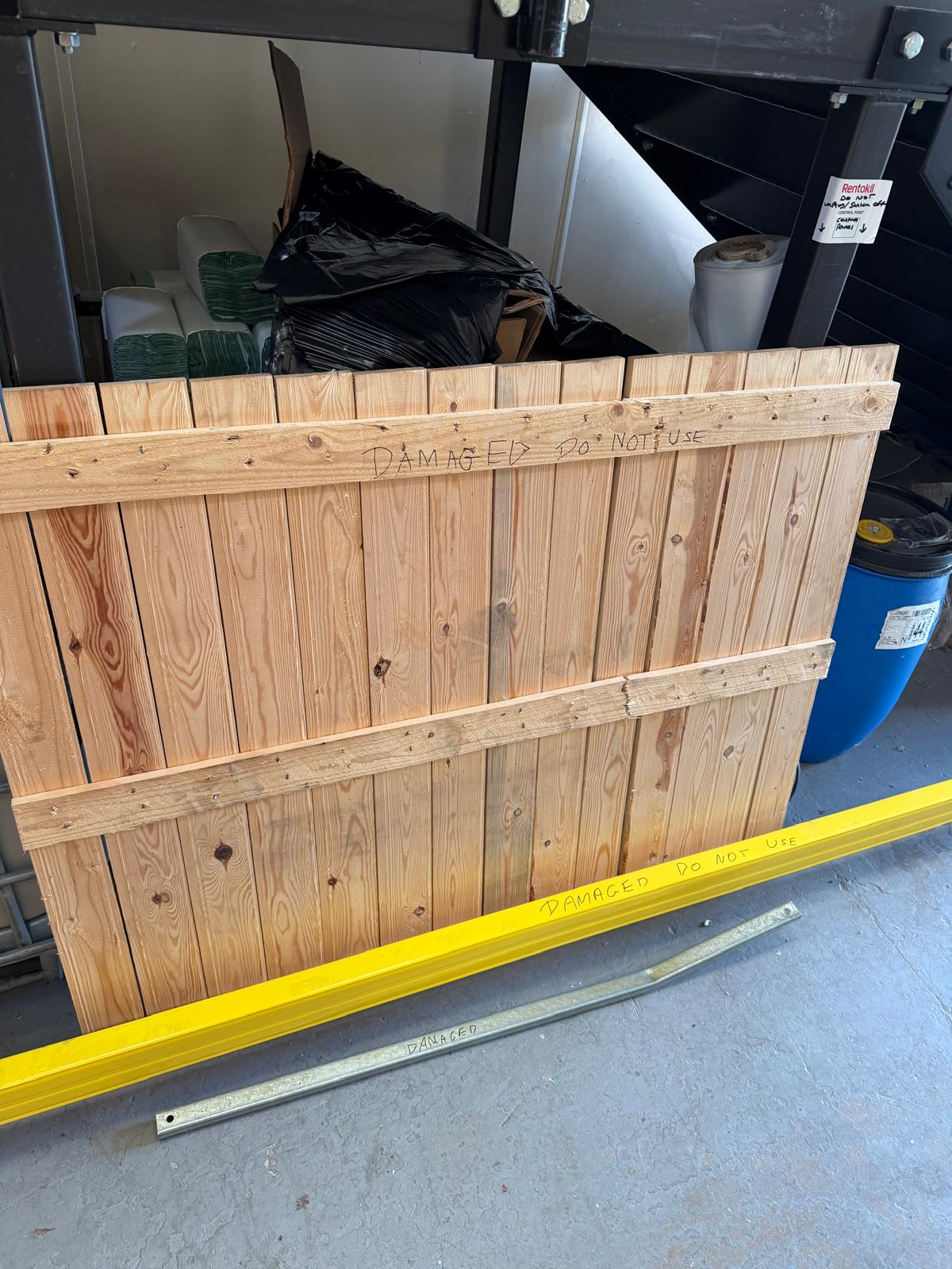 Close-up of a pallet racking beam connector and locking mechanism engaged into the upright after repair