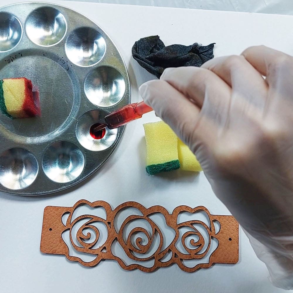 Step 2: Place 4 to 5 drops of dye into tray well Step 2: I place 4 to 5 drops of dye into the tray well.