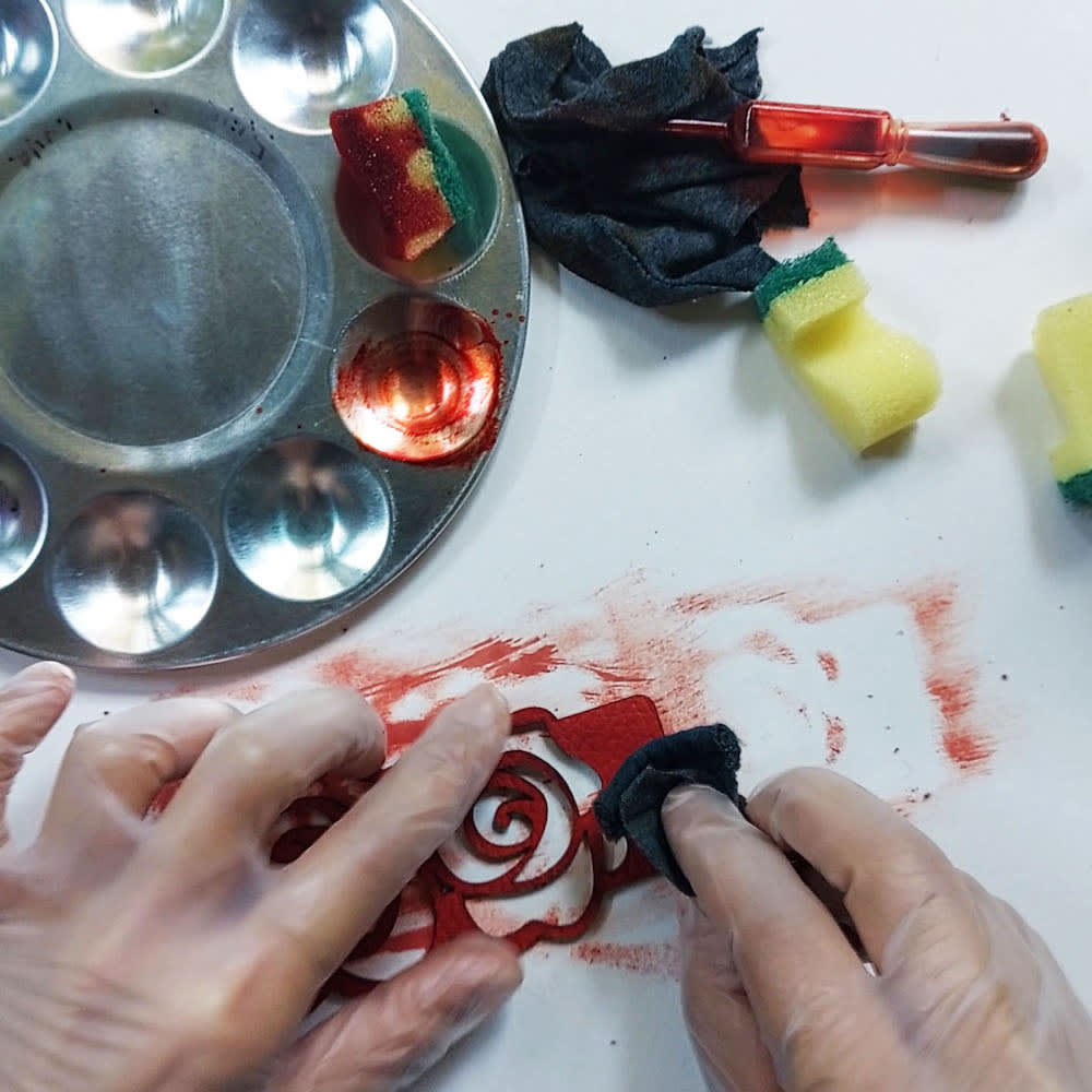 Step 6: Buff off excess dye with a rag Step 6: I buff off the excess dye with a rag.